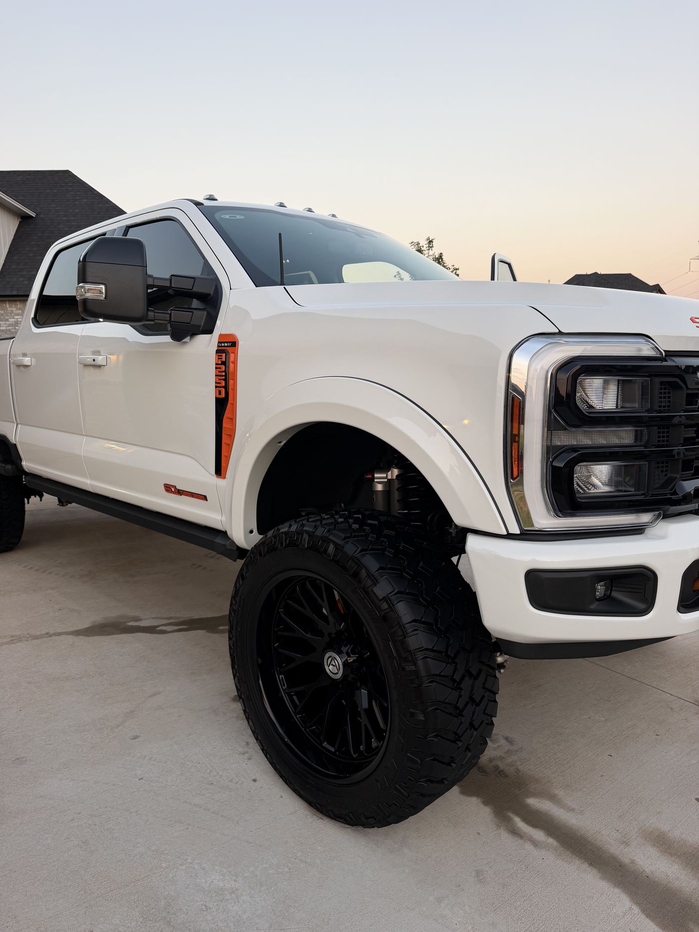 White Ford Super Duty after a full exterior detail